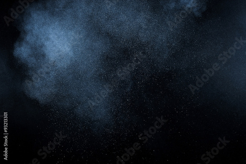 abstract white dust explosion on black background. abstract white powder explosion on black background