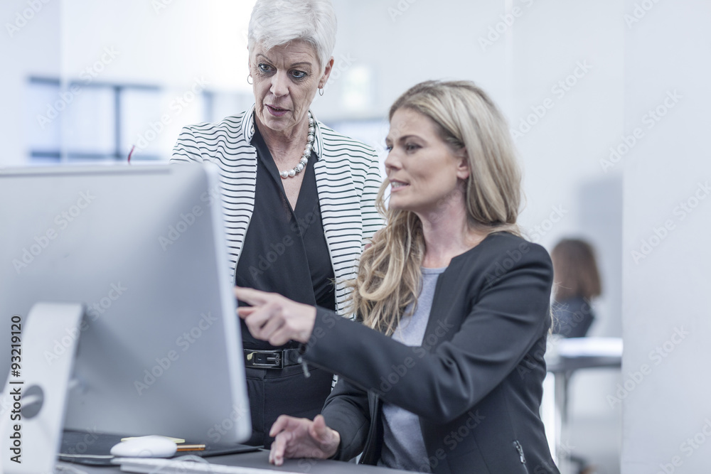 Colleagues in office working together Colleagues in office working together