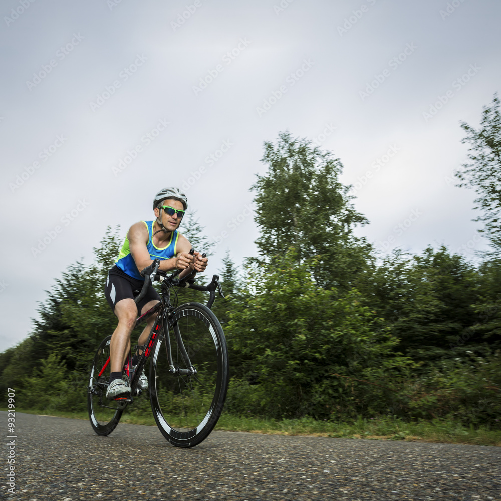 Germany, Baden-Wuerttemberg, triathlete on bicycle