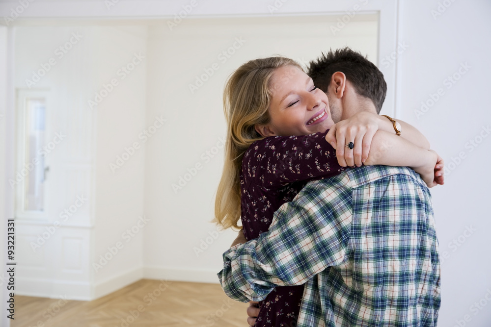 Happy young couple hugging Happy young couple hugging