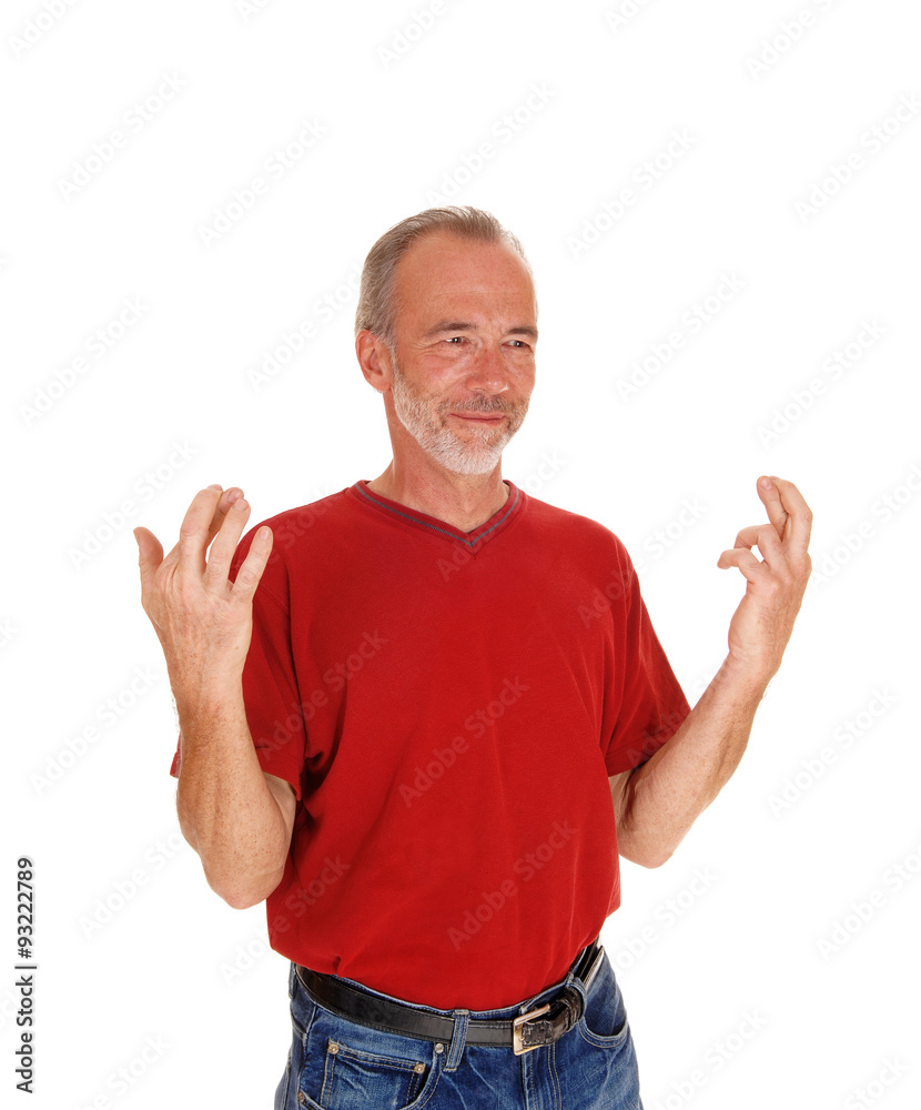 Middle age man with finger crossed. Middle age man with finger crossed.