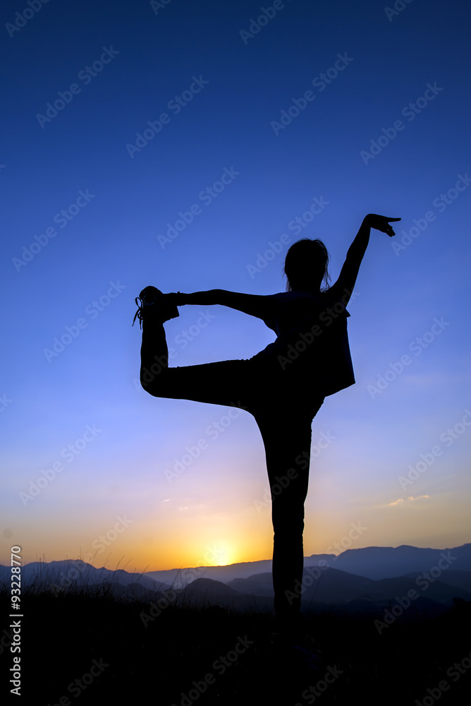 silhouette of young women who exercise at sunset silhouette of young women who exercise at sunset