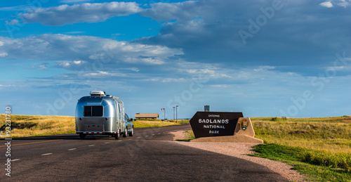 Car and Travel Trailer entering National Park