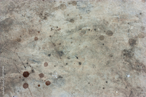 The cement floor, blood stains