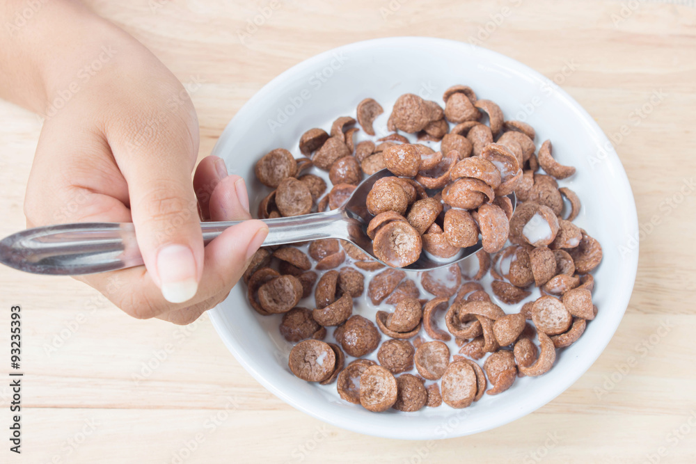 Fototapeta premium Cocoa cereal with milk