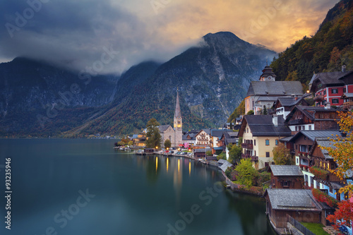 Hallstatt, Austria. Image of famous alpine village Halstatt during colourful autumn sunset. photo