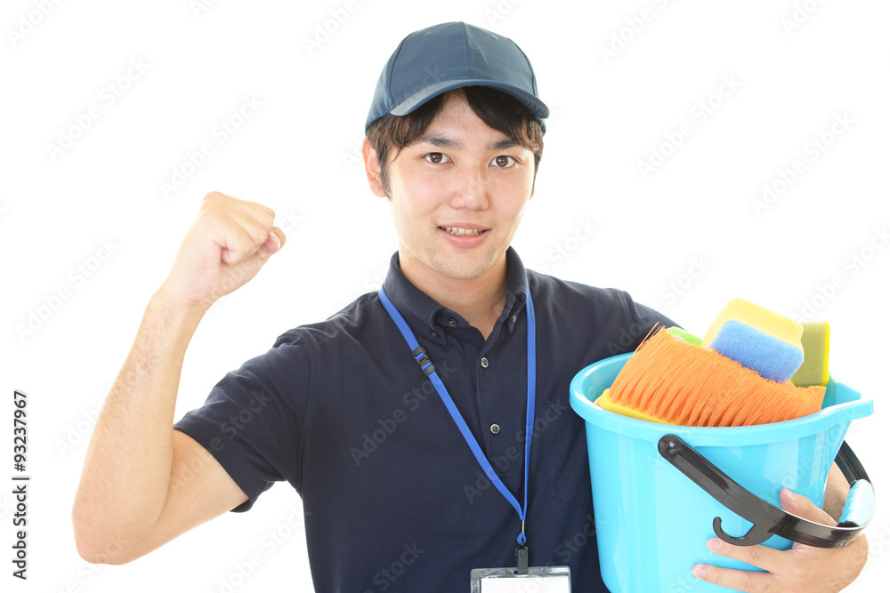 ガッツポーズの清掃員