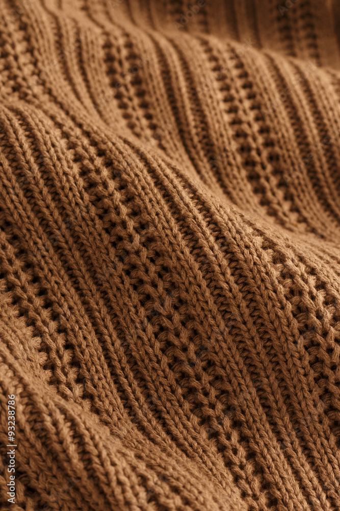 Brown knit fabric texture and background Brown knit fabric texture and background