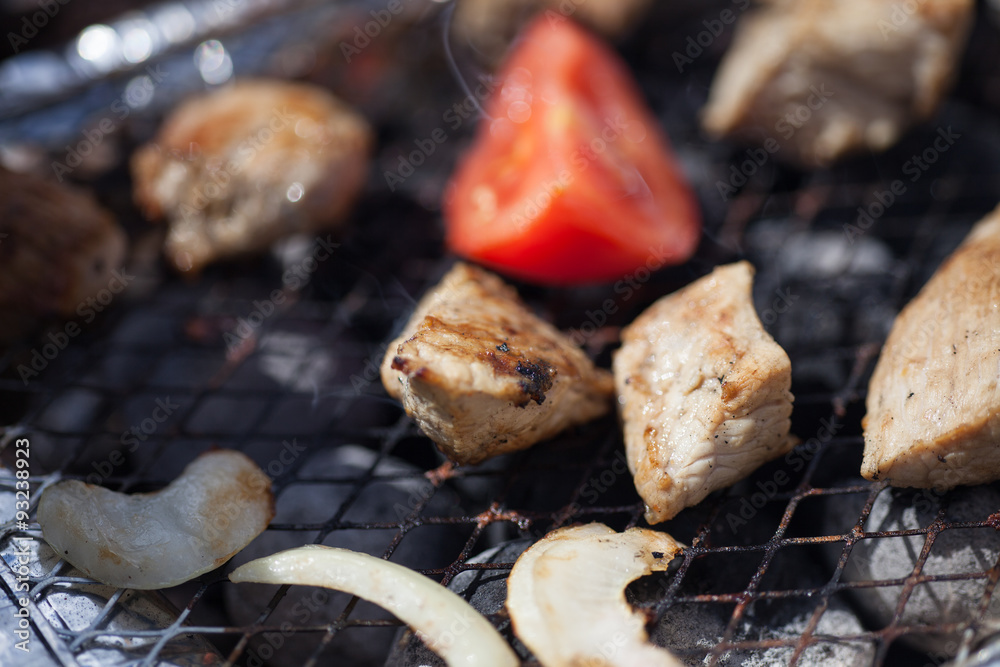Cooking of a barbecue on a grill Cooking of a barbecue on a grill