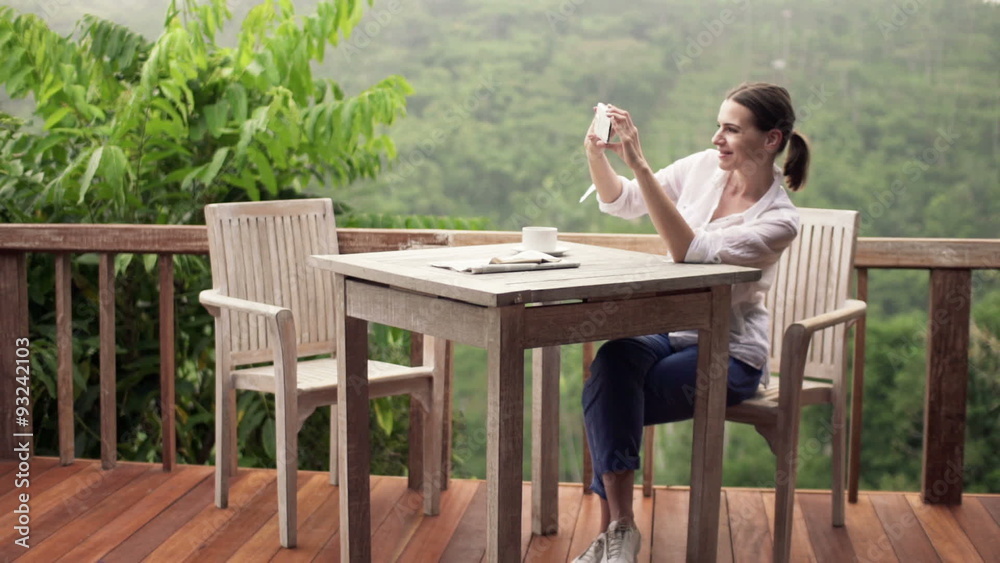 custom made wallpaper toronto digitalYoung woman taking selfie photo with cellphone on terrace