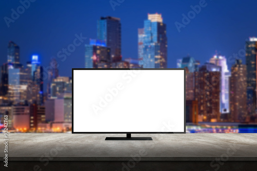isolated tv on desk with city skyline background for mock up presentation