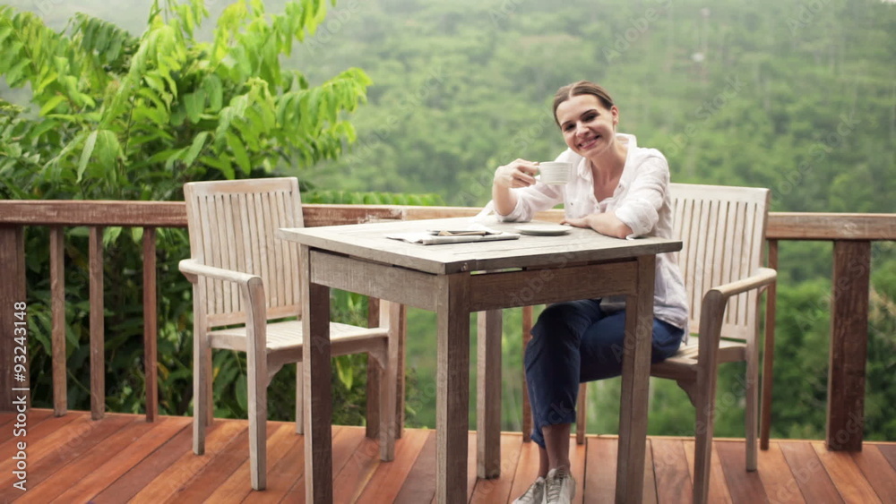 custom made wallpaper toronto digitalPortrait of happy, young woman drinking coffee by table on terrace