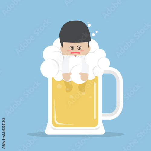 Drunk businessman in beer mug