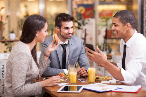 Business people enjoy in lunch at restaurant photo