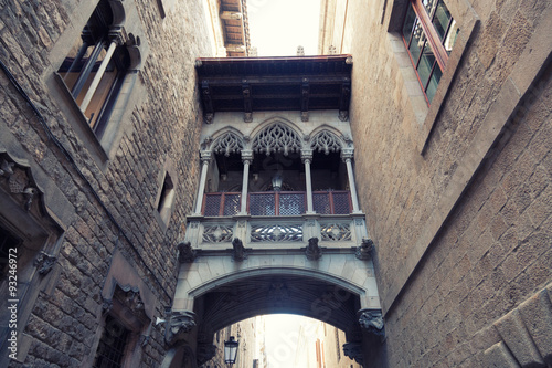 Ancient arch in Gothic quarter in Barcelona photo