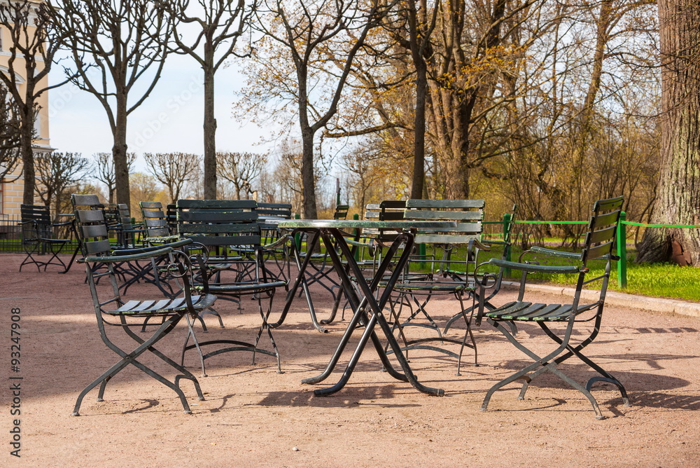 Street cafe with tables and chairs in the Spring Park