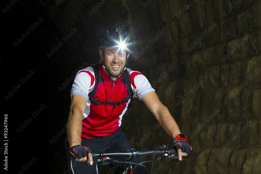 Portrait Mountainbiker mit Stirnlampe - obrazy, fototapety, plakaty 
