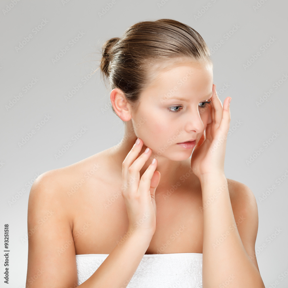 Woman massaging pain head 