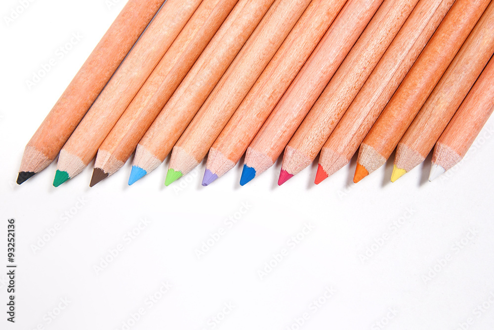 Fototapeta premium Close up view of different color pencils isolated on the white b