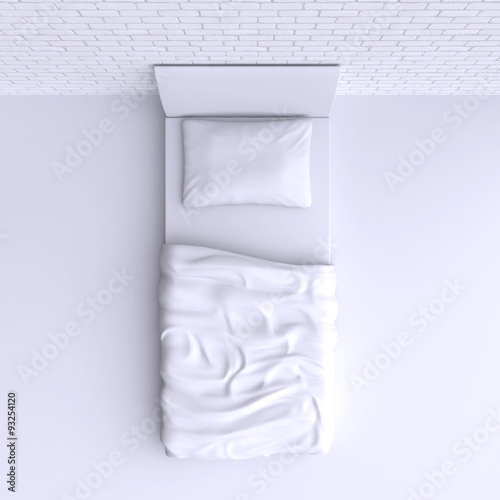 Bed with pillow and blanket in the corner room