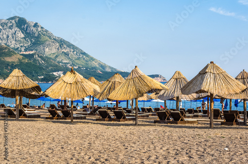 Umbrellas and loungers on the beach © dvad