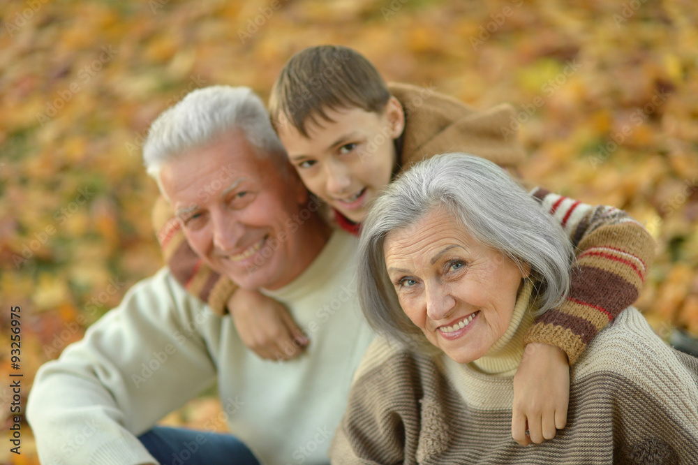 Fototapeta premium Happy family in autumn forest