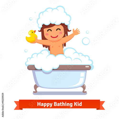 Baby girl taking bath with duck toy and bubbles
