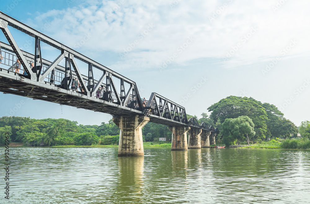 Fototapeta premium THAILAND,Kanchanaburi: 2015-Sep-19 Train line death railway at river kwai bridge over sky and cloudy