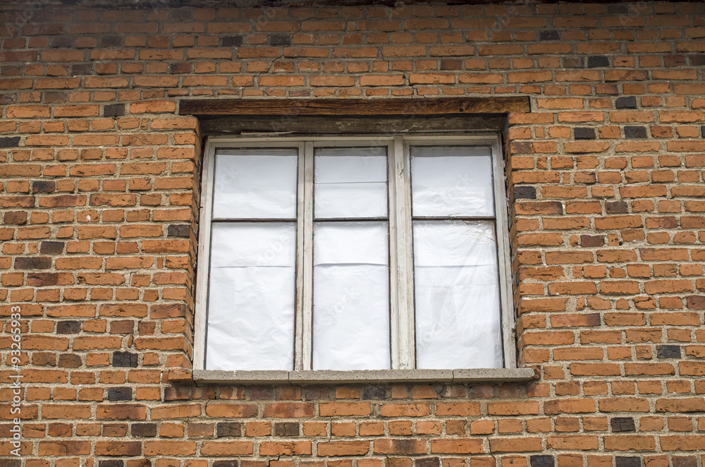 Window and wall of old brick house