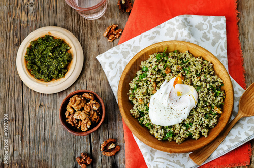 Basil nuts pesto quinoa with walnuts, parsley and poached egg