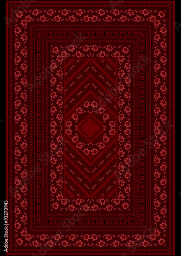Carpet with a pattern red from roses on the border and the middle on a burgundy background
