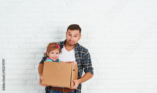 happy family moves to new apartment.