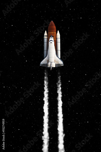 Fototapeta Naklejka Na Ścianę i Meble -  Space shuttle taking off on a mission. Elements of this image