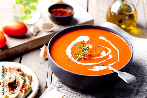Obraz na plátně Tomato, red pepper soup, sauce with rosemary