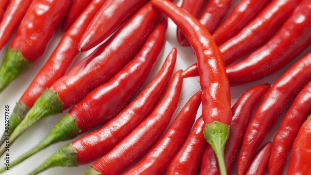 Red chili peppers closeup rotating. 4K UHD.
Red chili peppers closeup rotating. 4K UHD.