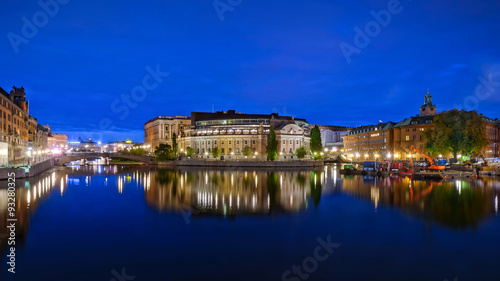 Rosenbad during late evening with blue sky and water photo