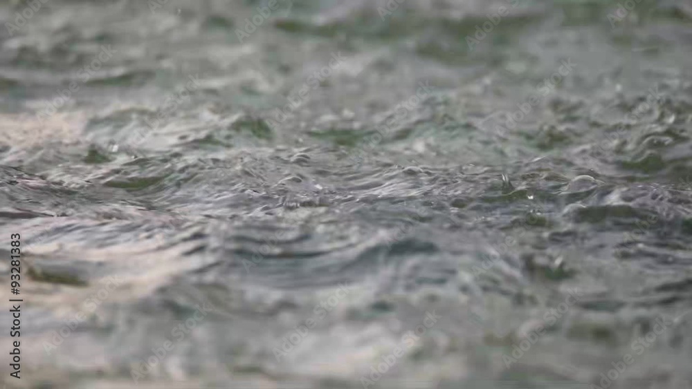 Slow-motion water drops falling down shooted with high speed Slow-motion water drops falling down shooted with high speed