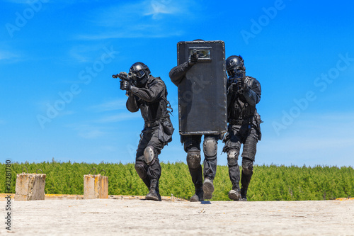 SWAT officers with ballistic shield 