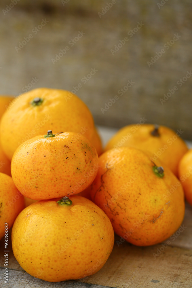 Fresh orange on wooden table in dining room. Healthy fruit for lose weight ,Fresh oranges on wooden background. Fresh orange on wooden table in dining room. Healthy fruit for lose weight ,Fresh oranges on wooden background.