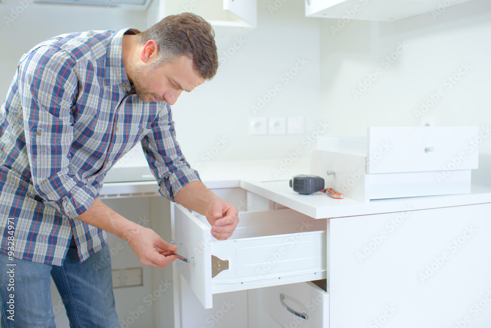 Man assembling furniture