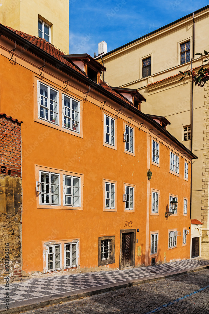Facade of an ancient tenement in Prague, Czech Republic.