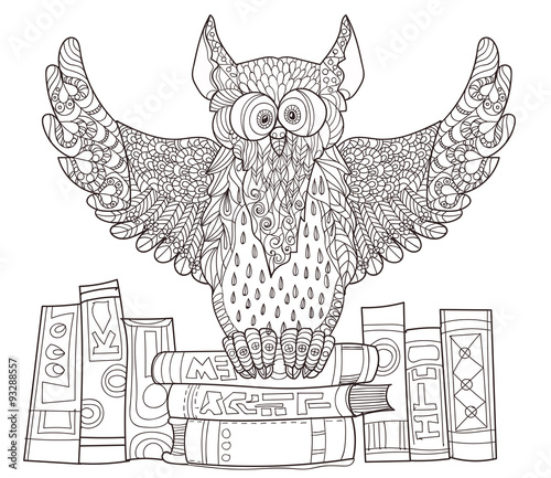 Owl  on books.