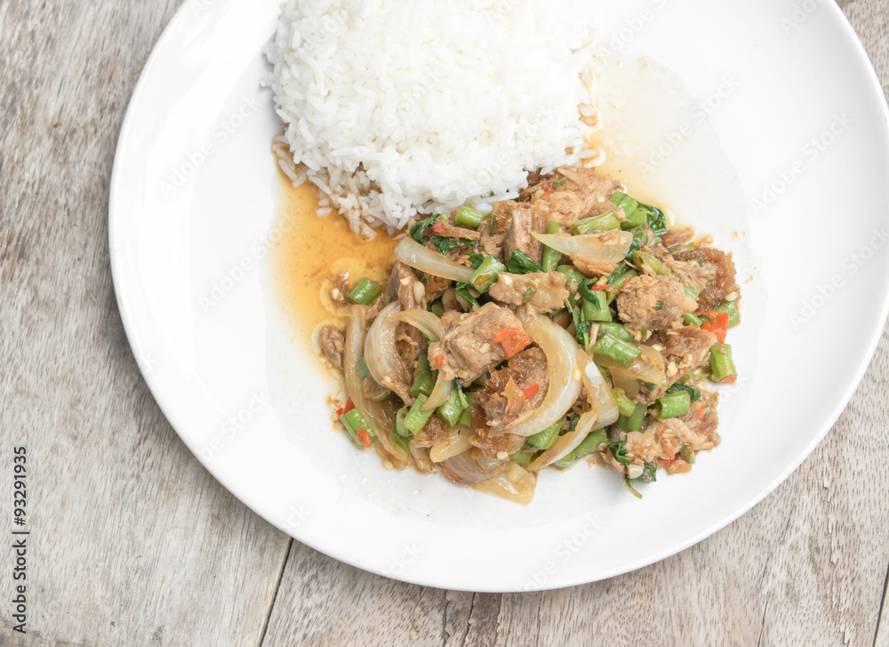 Basil Fried Rice with stir fried crispy Pork, Thai famous food Basil Fried Rice with stir fried crispy Pork, Thai famous food