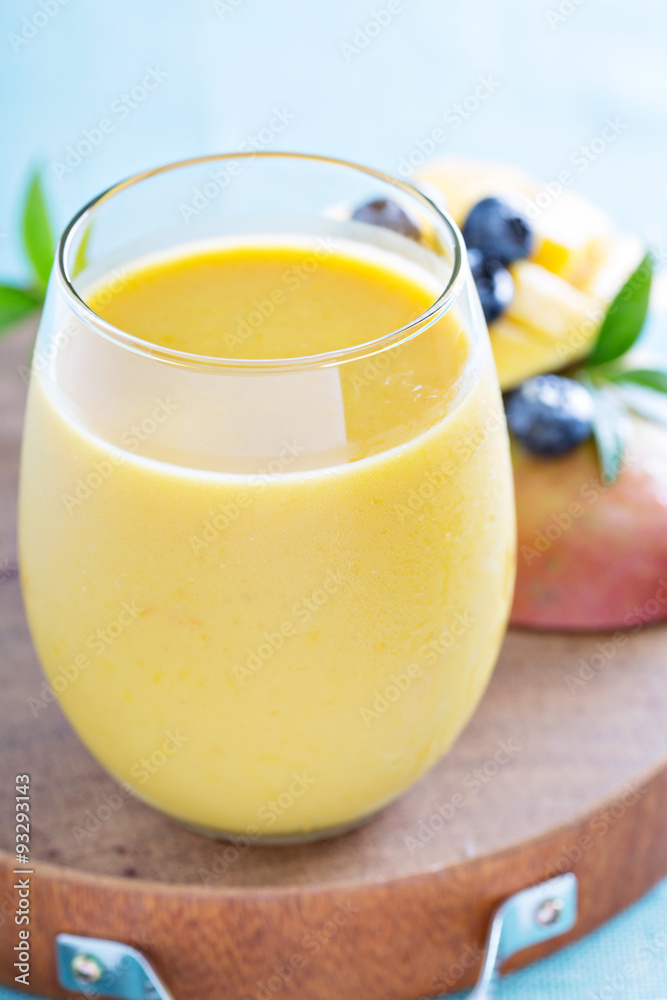 Mango smoothie on a board Mango smoothie on a board
