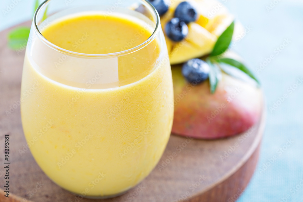 Mango smoothie on a board Mango smoothie on a board