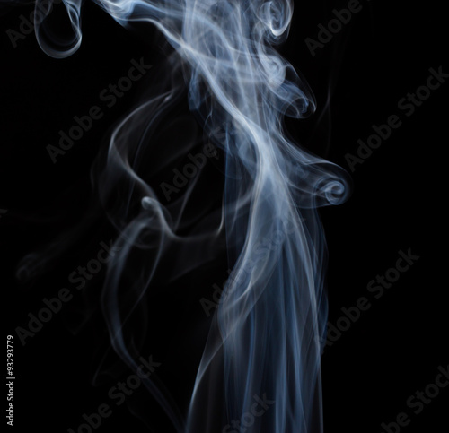 Fototapeta Naklejka Na Ścianę i Meble -  Abstract white floating smoke on dark background