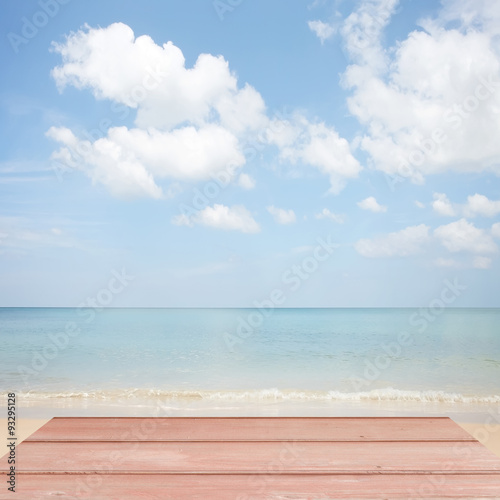 wooden floor with beautiful blue sky scenery for background.