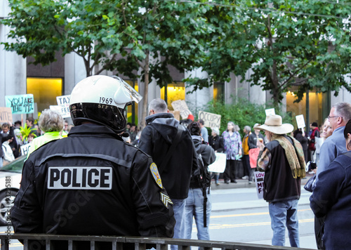 San Francisco police looking at the protestor at Market Street