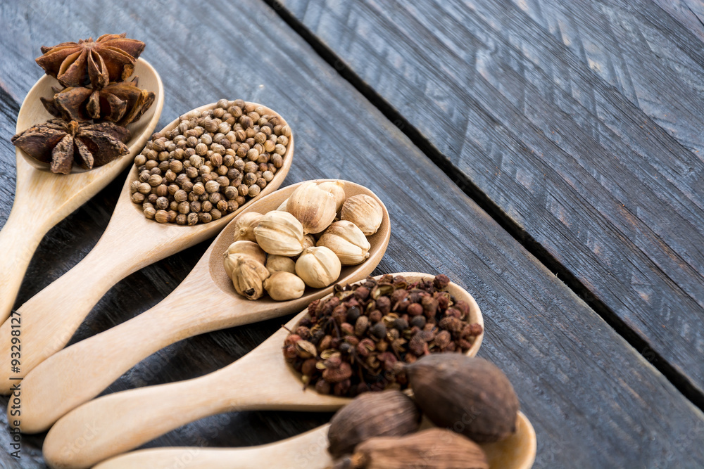 Spices and herbs in  bowls.