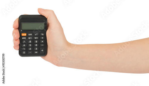 Humans hand holding calculator